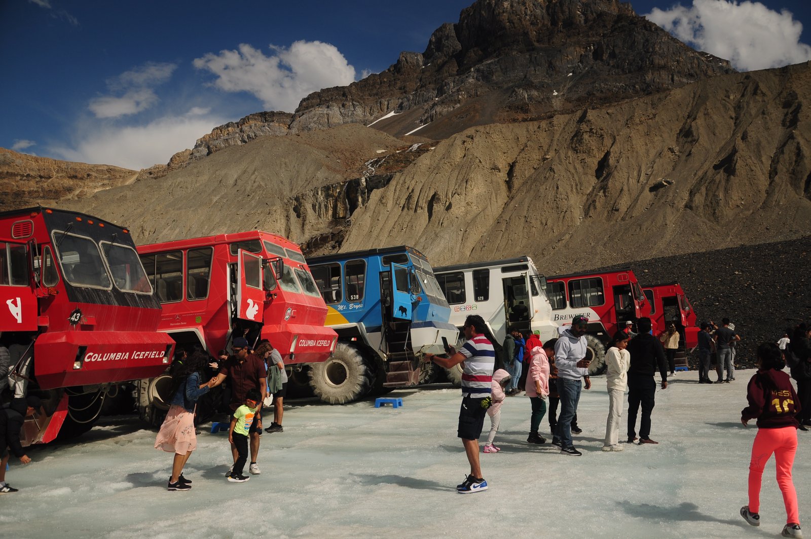 Ice explorers parked on the glacier at the Columbia Icefield