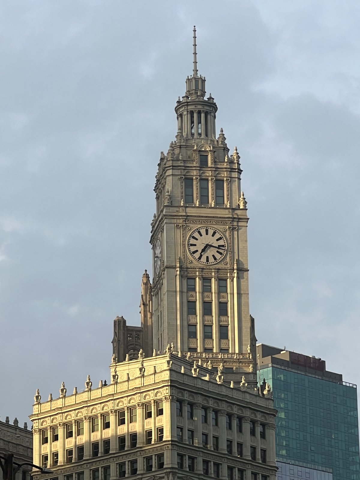 The Wrigley Building clock tower in golden evening light